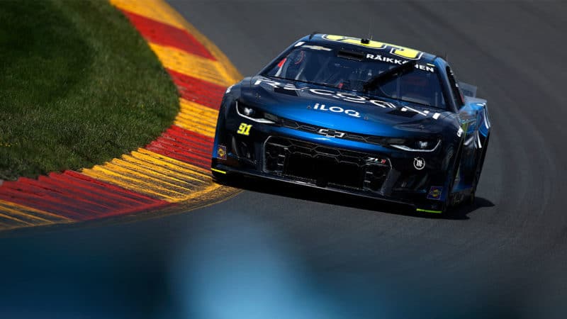 B-Kimi-Raikkonen-driving-at-the-2022-Watkins-Glen-NASCAR-race