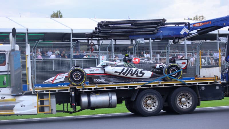Haas of Oliver Bearman is removed on a low loader in 2025 F1 Australian Grand Prix qualifying