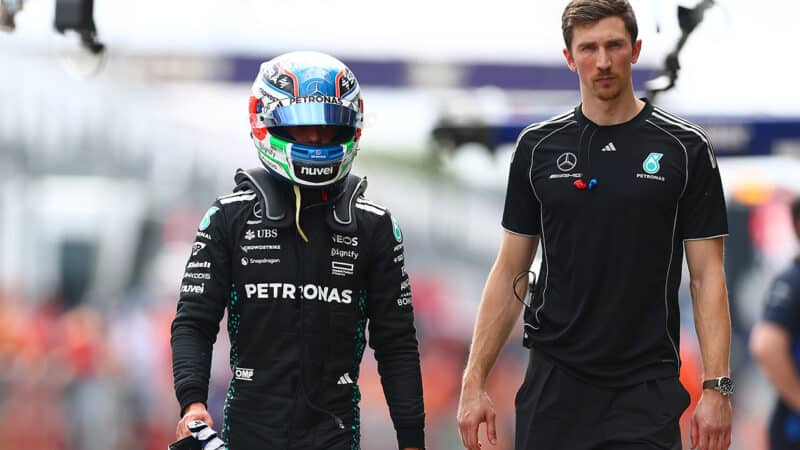 Kimi Antonelli walks back to his pit garage after being knocked out of 2025 F1 Australian GP qualifying