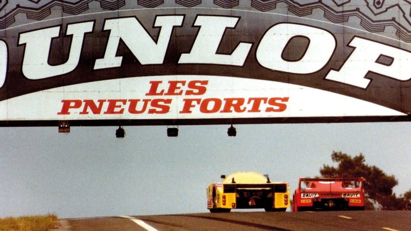 Lola T610 pursues the French-entered URD under Dunlop Bridge
