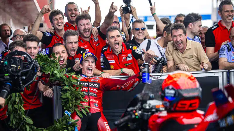 Marc Marquez celebrates with Ducati team in the pitlane after winning the 2025 MotoGP Argentine GP