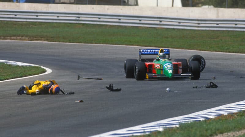 Martin Donnelly lies on Jerez track after crash threw him from his F1 car